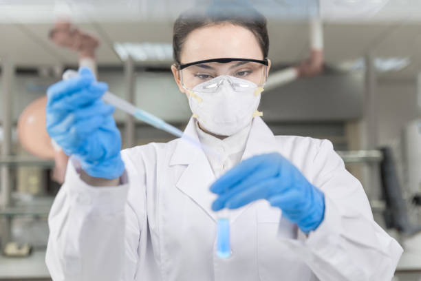 istock Young female scientist working in the laboratory 966879802