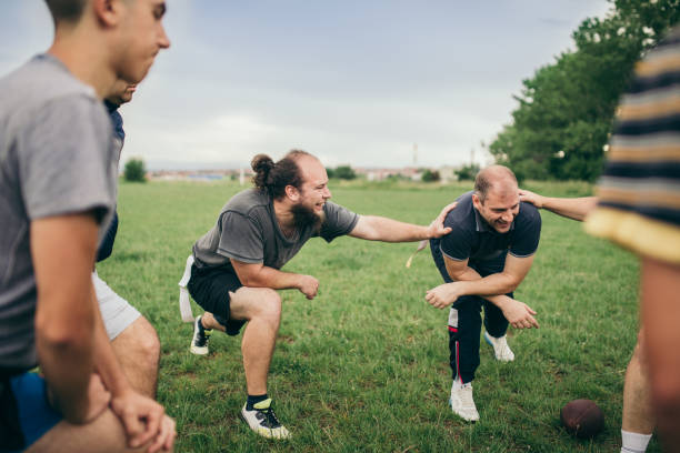 istock Amateurs playing american football 966883690