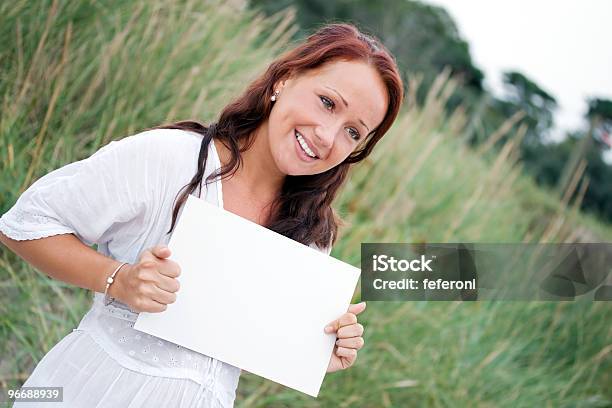 Smiling Young Woman Stock Photo - Download Image Now - Adult, Adults Only, Advertisement