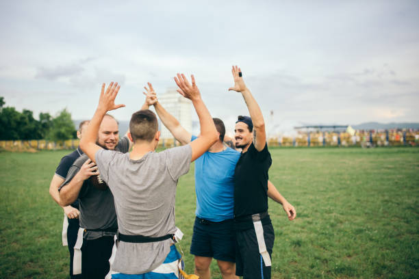 istock Amateurs playing american football 966889624