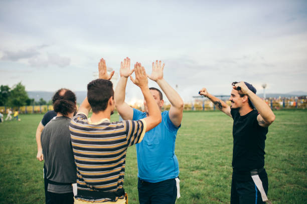 istock Amateurs playing american football 966889980