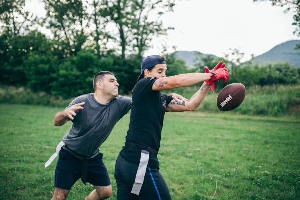 istock Amateurs playing american football 966892432