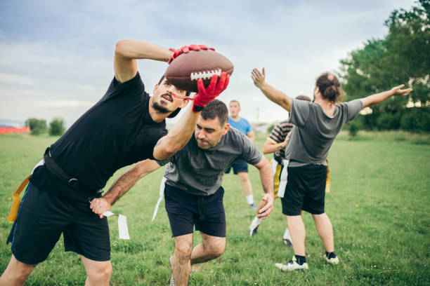 istock Amateurs playing american football 966892964