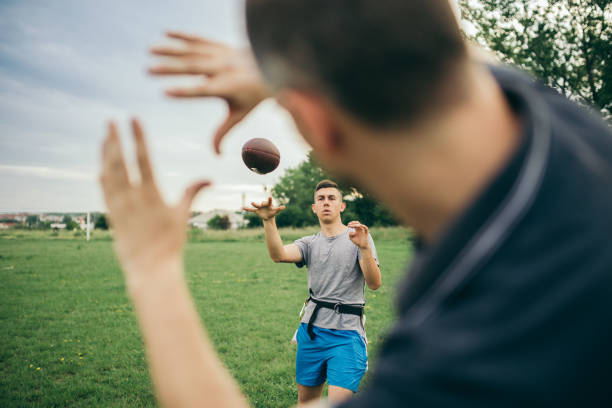 istock Amateurs playing american football 966893434