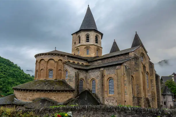 Conques, Midi Pyrenees, France - June 12, 2015:View to Abbey of Saint-Foy at Conques, France
