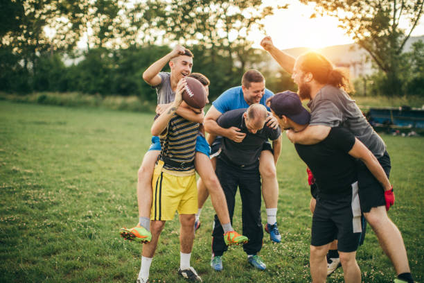 istock Amateurs playing american football 966899744
