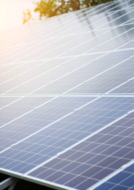 istock Close-up of shiny blue photo voltaic solar system surface lit by summer sun 966904324