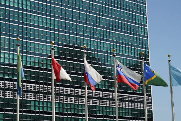 istock flags outside united nations building in new york 966905726