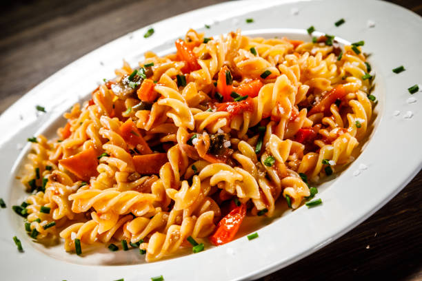 istock Pasta with meat tomato sauce and vegetables 966909010