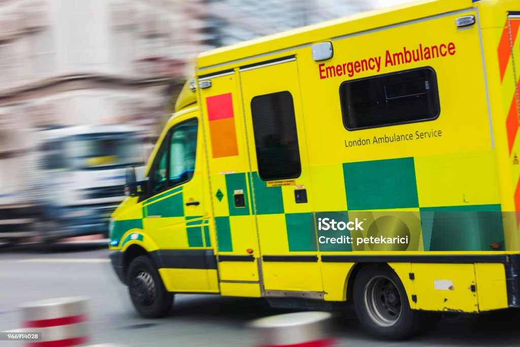 Speeding ambulance Speeding ambulance, London Ambulance Stock Photo