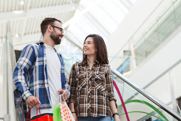 istock Couple in shopping together 966915206