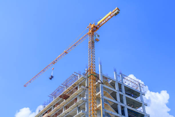 istock high big construction site in develop city and tower crane working. with copy space add text 966921212