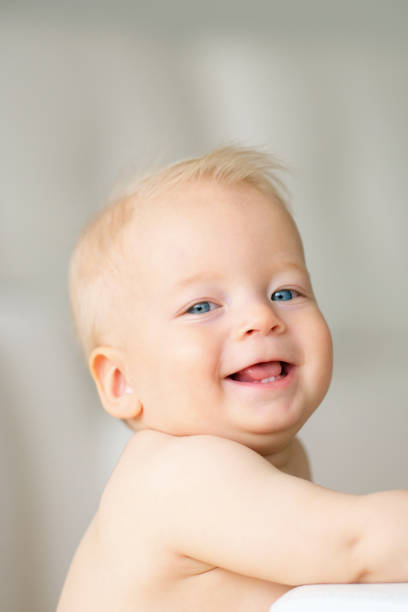 istock Baby boy with blue eyes 966921812