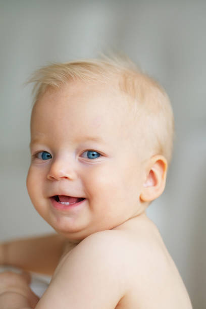 istock Baby boy with blue eyes 966921824