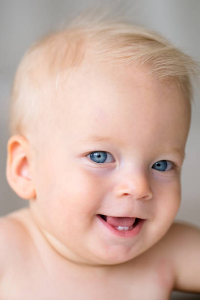 istock Baby boy with blue eyes 966921846