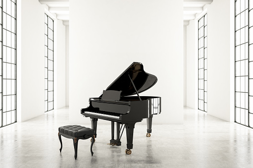 Piano in empty white room