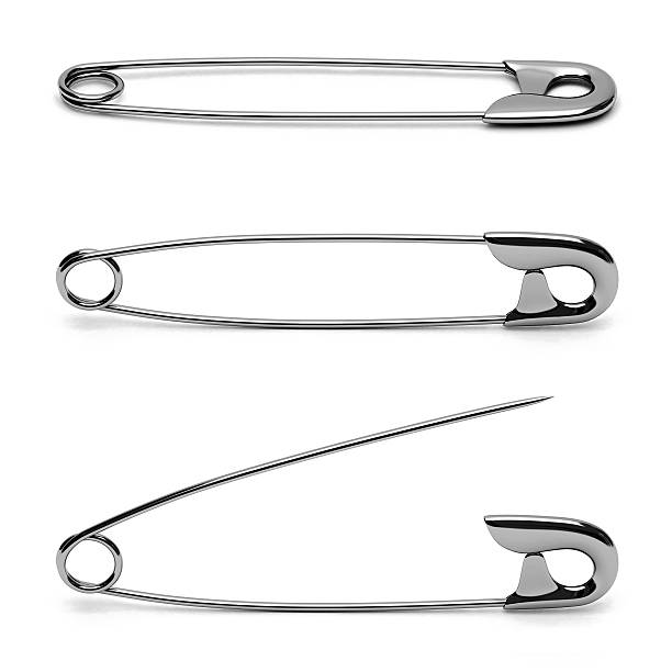 Safety pin in silver stock photo