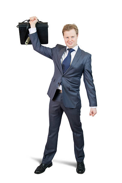 istock happy businessman holding brief case 96694930
