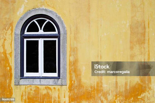 Traditional Window On Yellow Background Wall In The Sun Stock Photo - Download Image Now