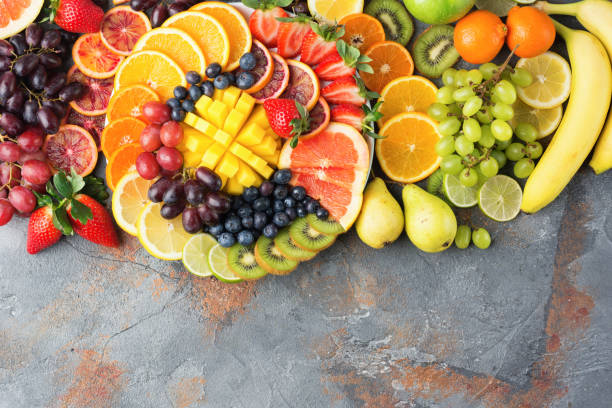 istock Rainbow fruits and vegetables, top view 966952890