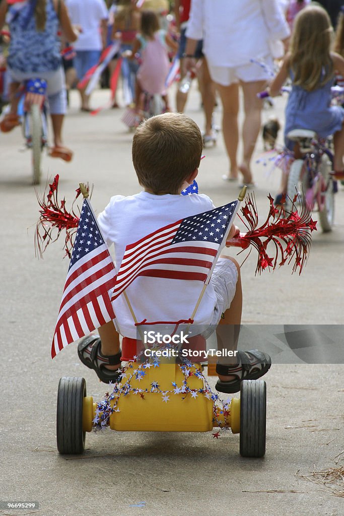 Young boy shows patriotism in 4th of July Parade  Parade Stock Photo