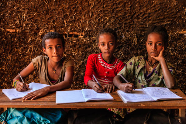 istock African children during the class, East Africa 966953208