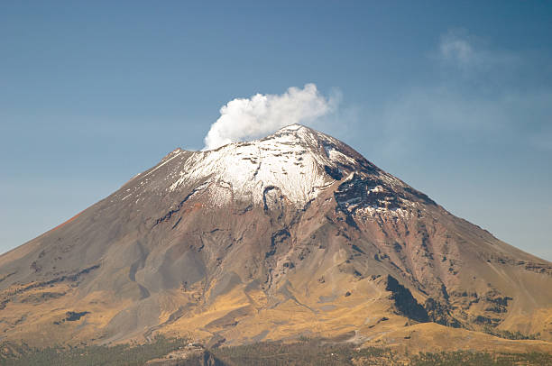 istock An active snowcapped Popocatepetl volcano is smoking 96695655