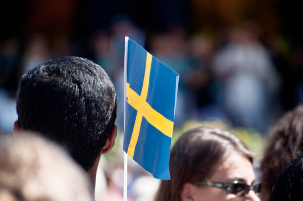 Cancelled Stamp From Sweden Featuring The National Flag.