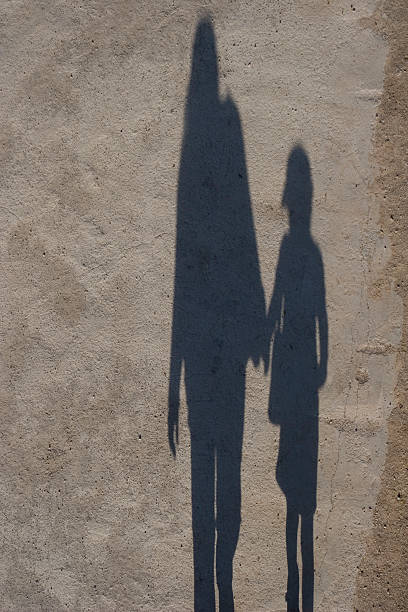 istock Shadow of a mother and doughter 96696056
