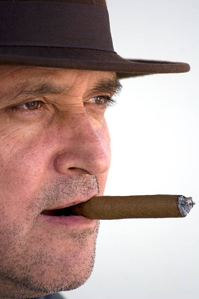 istock Senior adult man smoking cigar 96696197