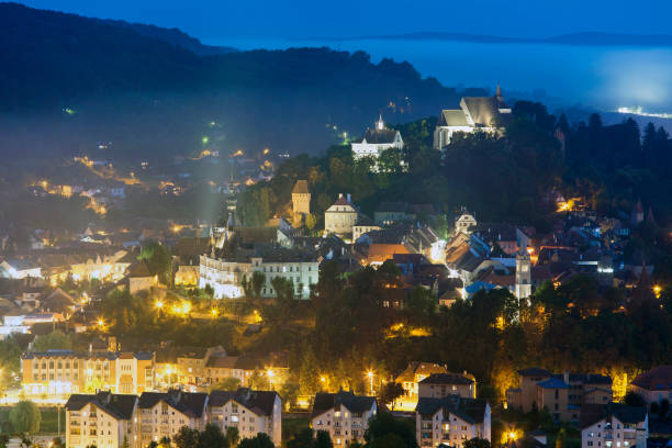 istock Sighisoara medieval town. night cityscape 966973106