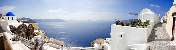 istock Oia village in Santorini island (panoramic composition) 96697834