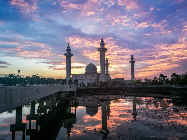 istock Dawn And A Mosque Reflections on the Surface of A Lake 966980040
