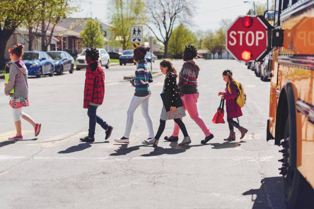 istock School kids crossing street 966985874