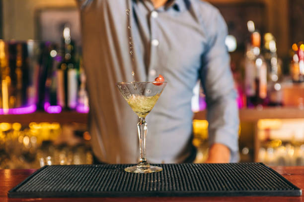 istock Barman is making cocktail at night club. 966987608