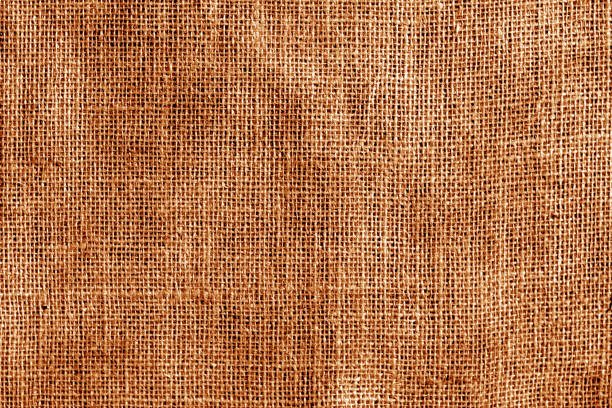istock Cotton fabric texture in orange color. 967006324