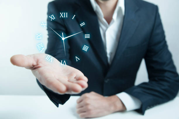 istock Businessman hand pushing time icon on virtual screen 967025738