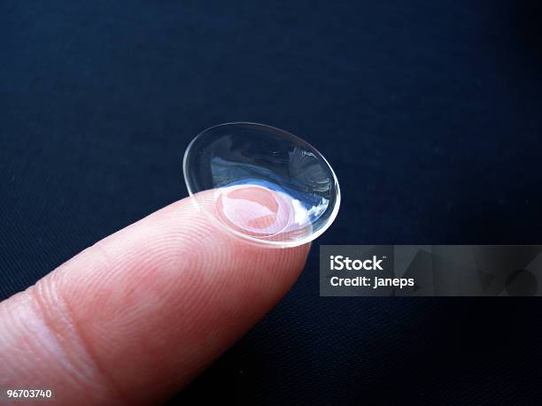 Closeup Image Of A Contact Lens Resting On A Fingertip Stock Photo - Download Image Now
