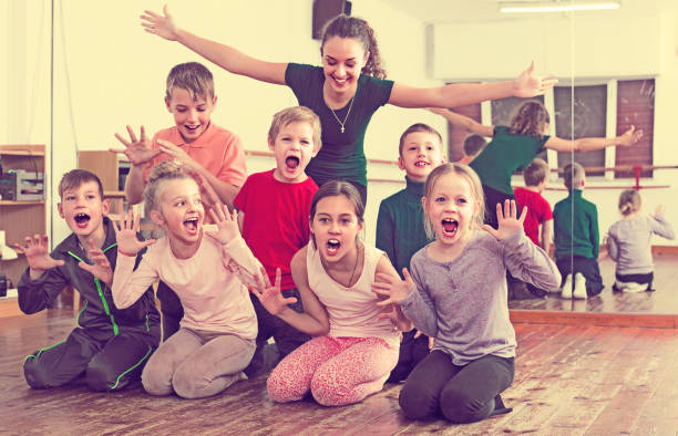 istock Little boys and girls posing 967041586