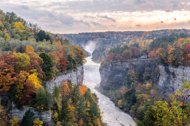 Autumn Colors at Letchworth State Park in New York Mist rises from one of the many waterfalls in New York's Letchworth State Park on a overcast autumn day. letchworth state park stock pictures, royalty-free photos & images