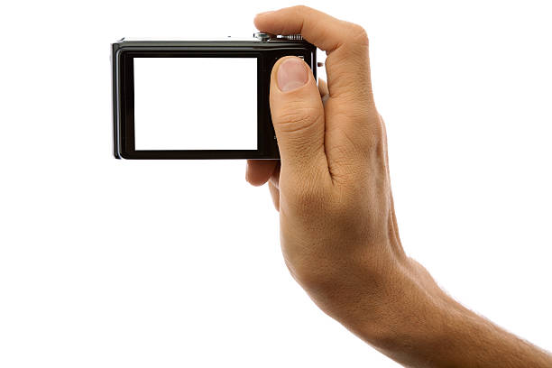 istock Photo camera in hand isolated on white background 96705914
