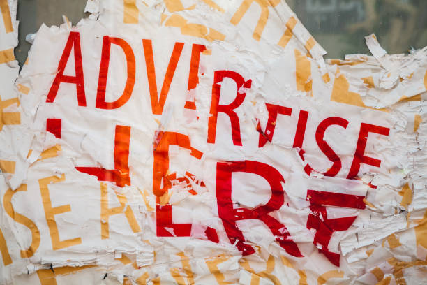 istock Advertise here, grungy scratched poster 967068784