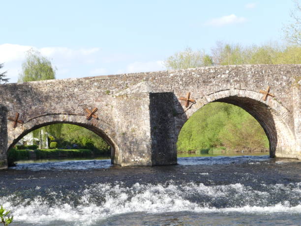 istock A Medieval stone bridge crossing the River Exe in Bickleigh village, Devon, England, UK on a summers day 967070454