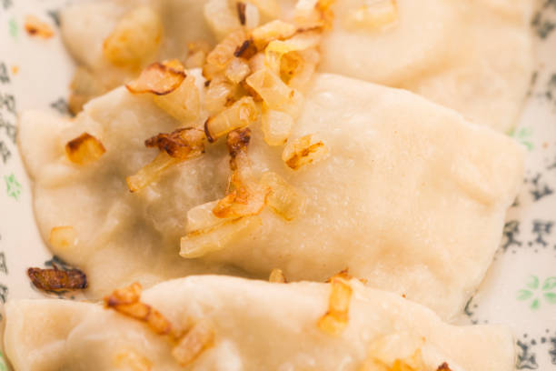 istock Polish pierogi filled with cabbage and mushrooms 967074974