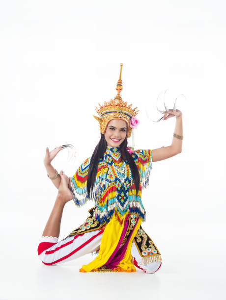 istock The lady in Southern thai classical dancing suit is posing on white background. 967075262