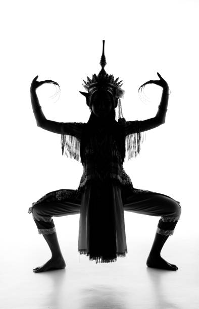 istock The lady in Southern thai classical dancing suit is posing on white background. 967075314