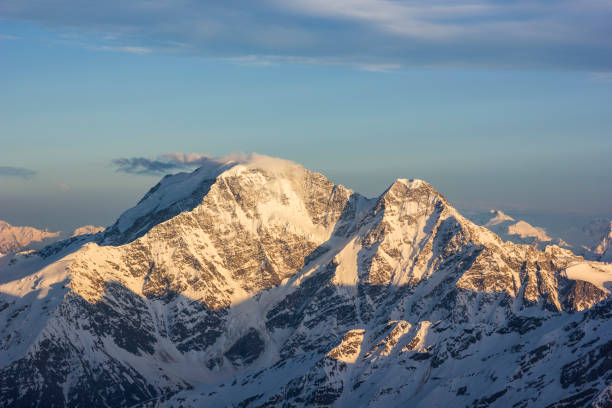 istock snowy Caucasus mountains at sunset 967075316