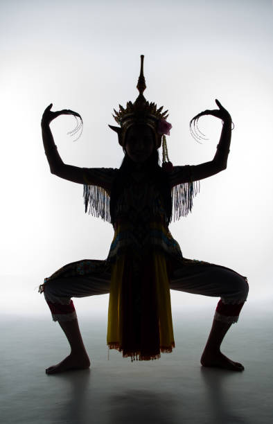 istock The lady in Southern thai classical dancing suit is posing on white background. 967075322