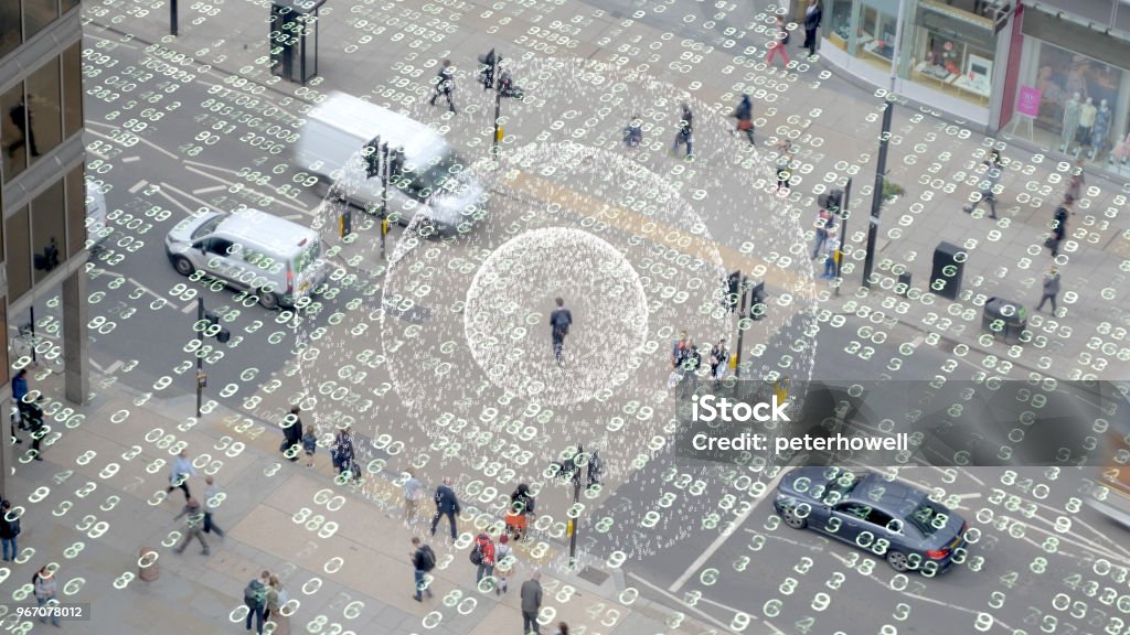 Phone signal in a data matrix city. Visualization of a radio signal coming from a mobile phone in a data filled scene. Surveillance Stock Photo