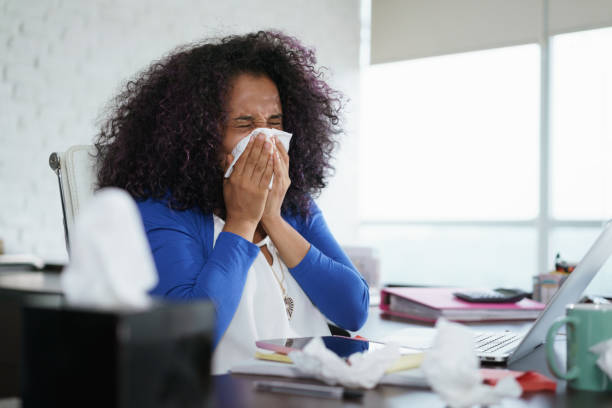 istock Black Woman Working from Home And Sneezing For Cold 967095382